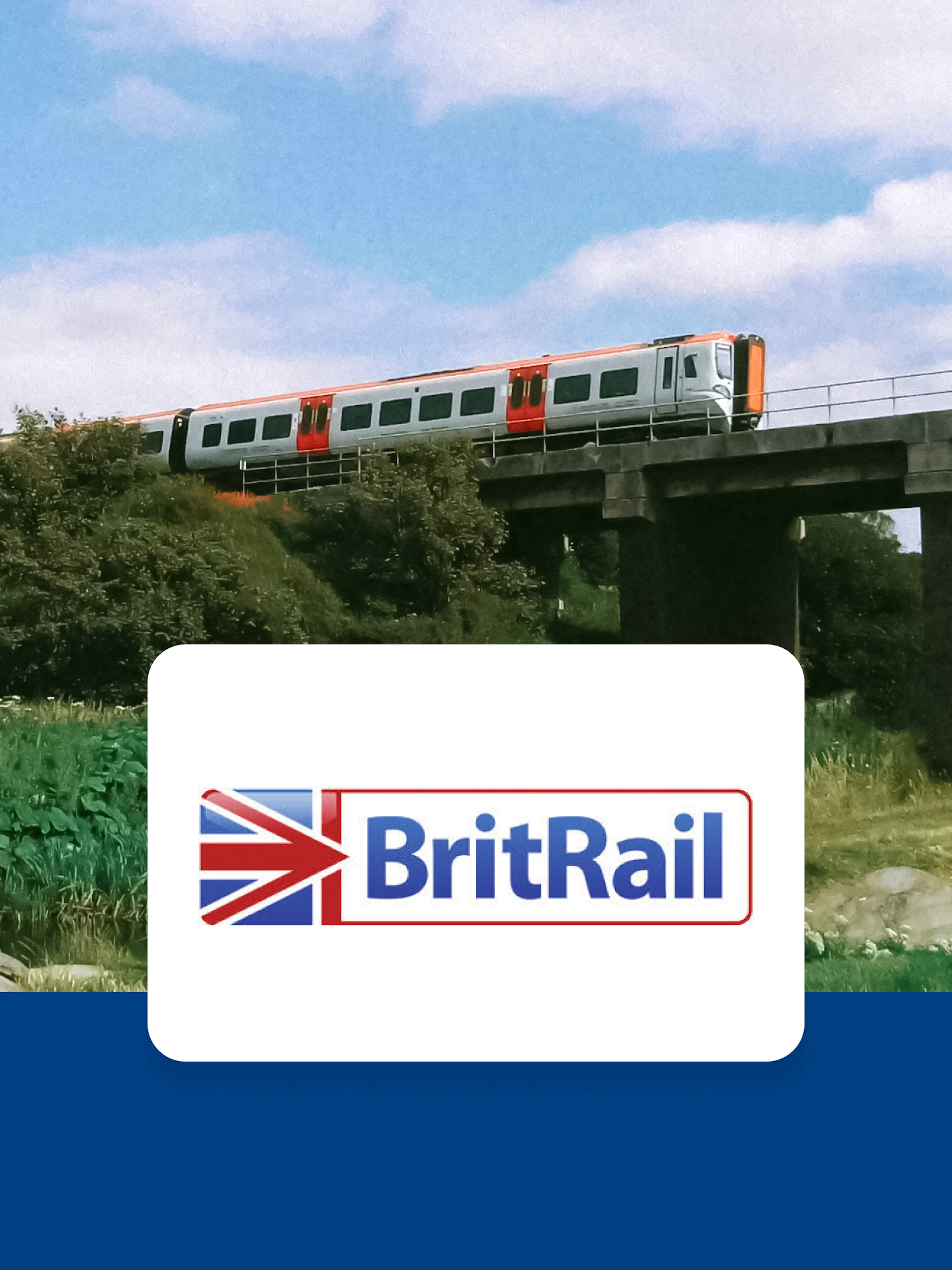 Train crossing a bridge in a rural landscape, BritRail logo in foreground.