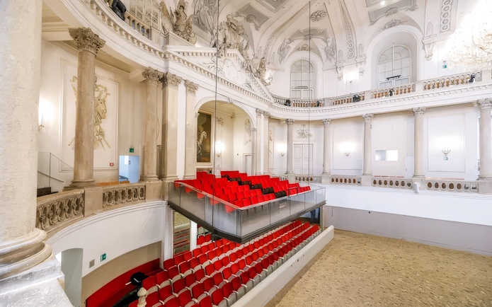 Royal box with red seats at the Winter Riding School, Vienna.