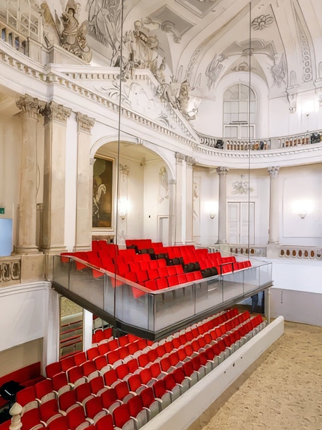 Royal box with red seats at the Winter Riding School, Vienna.