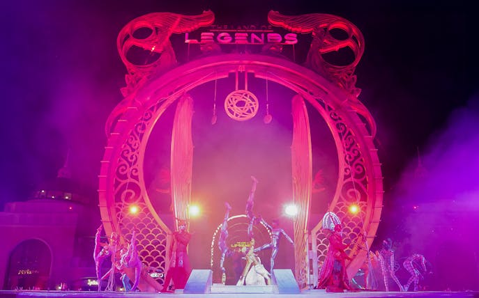 Land of Legends gate show illuminated at night, Antalya, Turkey.