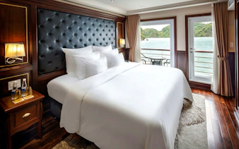 Deluxe cabin interior with ocean view on Ha Long Bay 5-Star Premium Cruise.