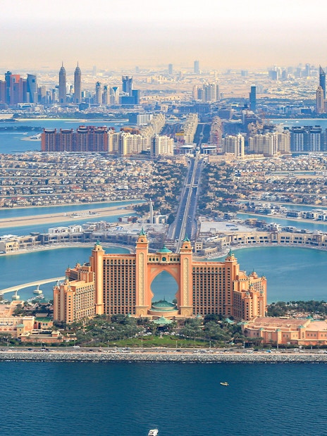Aerial view of Palm Jumeirah and Atlantis Hotel from Dubai Helicopter tour.