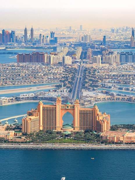 Aerial view of Palm Jumeirah and Atlantis Hotel from Dubai Helicopter tour.