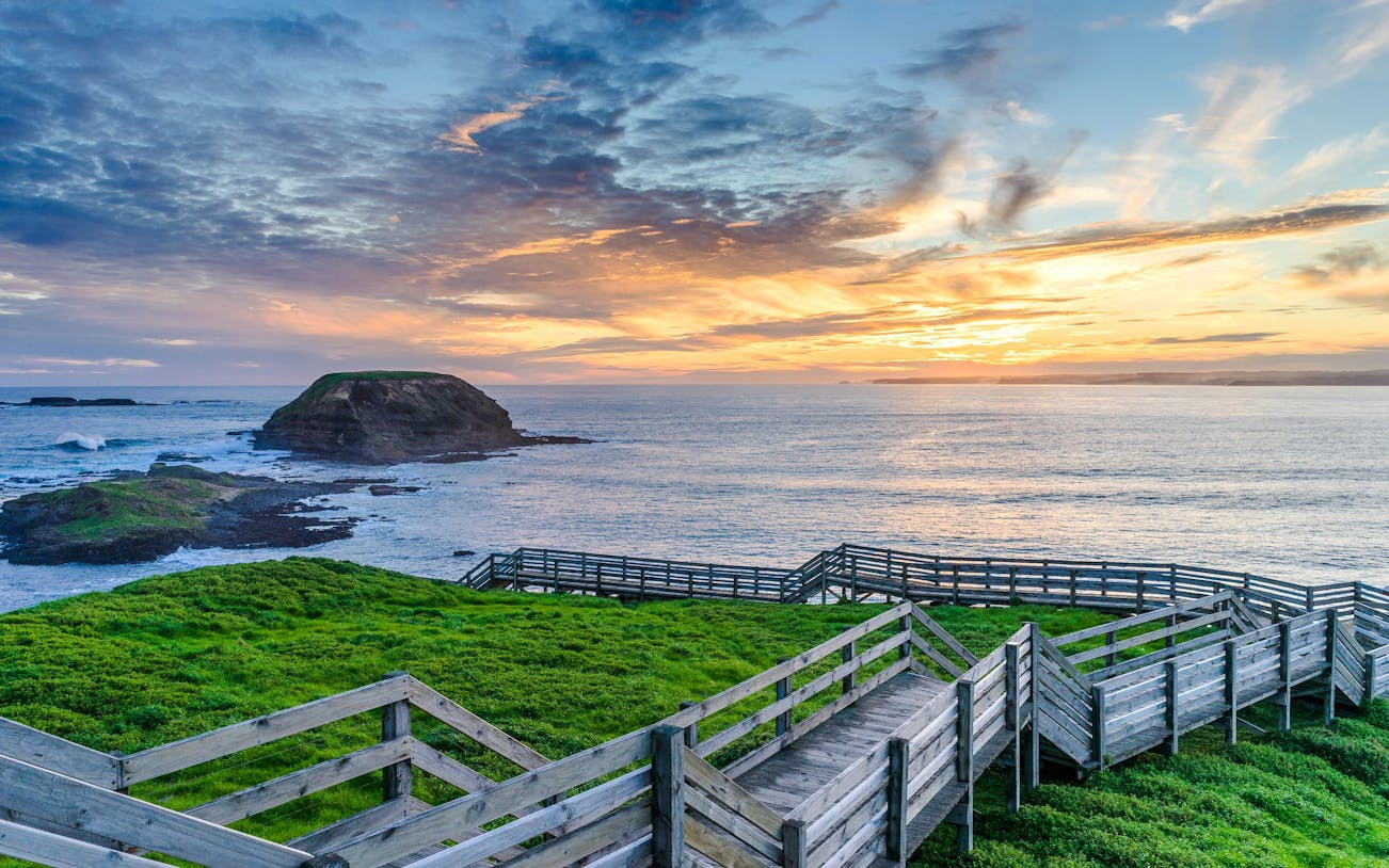 Boardwalk overlooking ocean at sunset on Phillip Island.