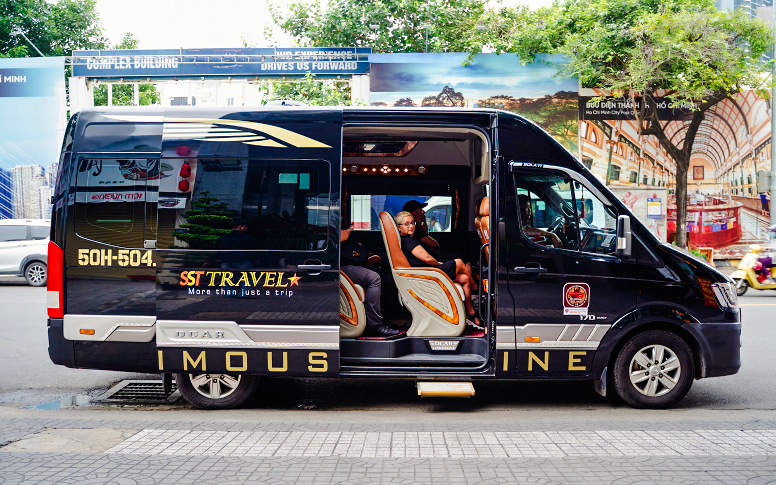 Transfer van for Cu Chi tunnels tour in Ho Chi Minh City.