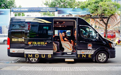 Transfer van for Cu Chi tunnels tour in Ho Chi Minh City.