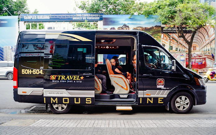 Transfer van for Cu Chi tunnels tour in Ho Chi Minh City.
