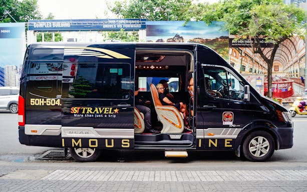 Transfer van for Cu Chi tunnels tour in Ho Chi Minh City.