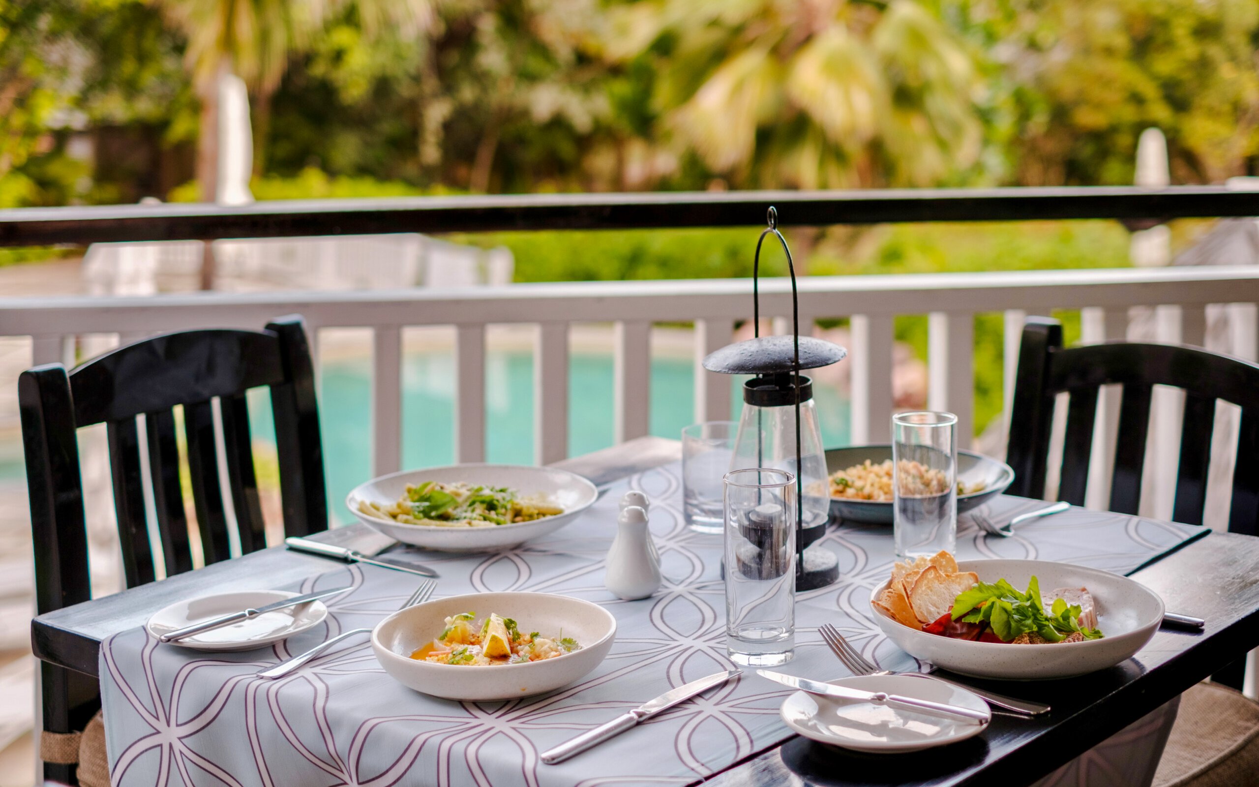 Lunch set on table at Malolo Island Resort, Fiji with garden view.