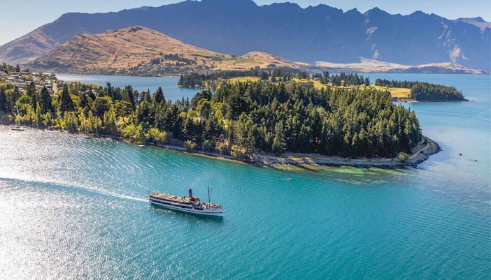 TSS Earnslaw steamship cruising Lake Wakatipu towards Walter Peak, New Zealand.