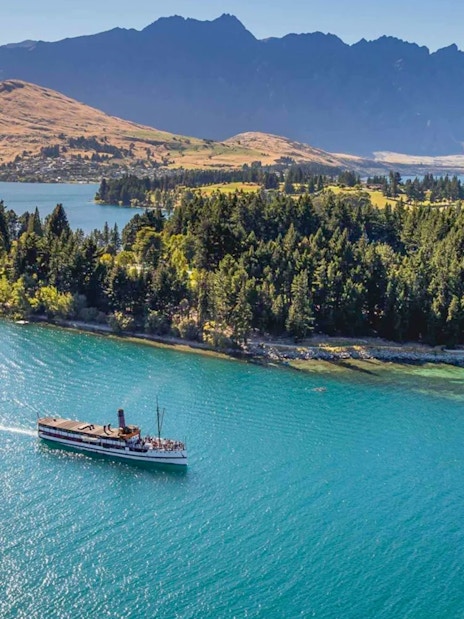TSS Earnslaw steamship cruising Lake Wakatipu towards Walter Peak, New Zealand.