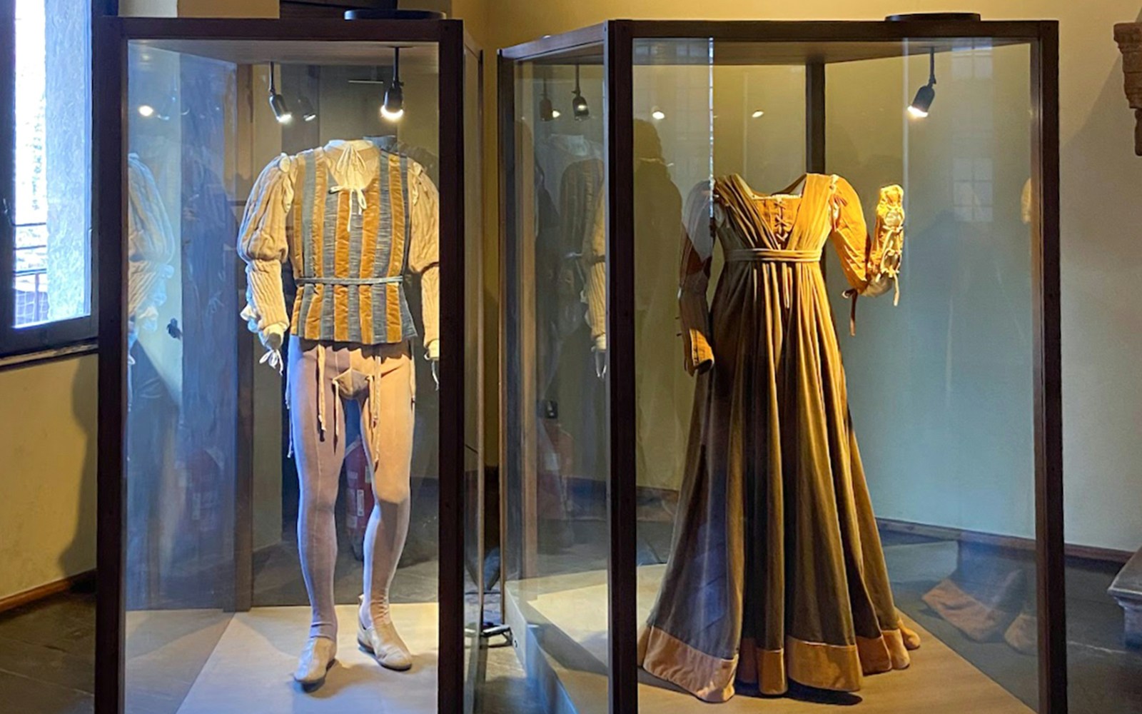 Period costumes displayed at Juliet’s House museum in Verona.