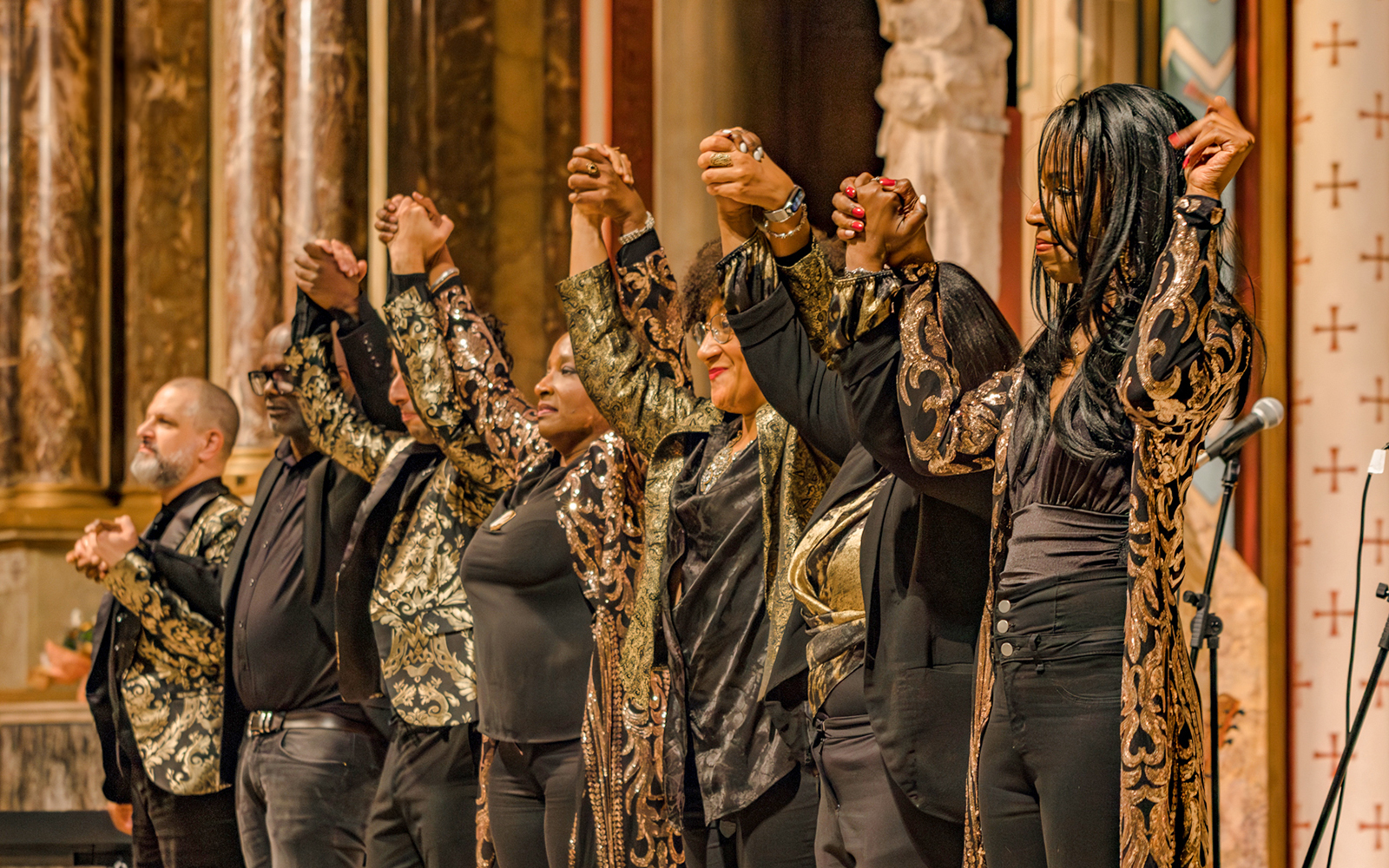 Orchestra taking a bow at St Sulpice Church concert.