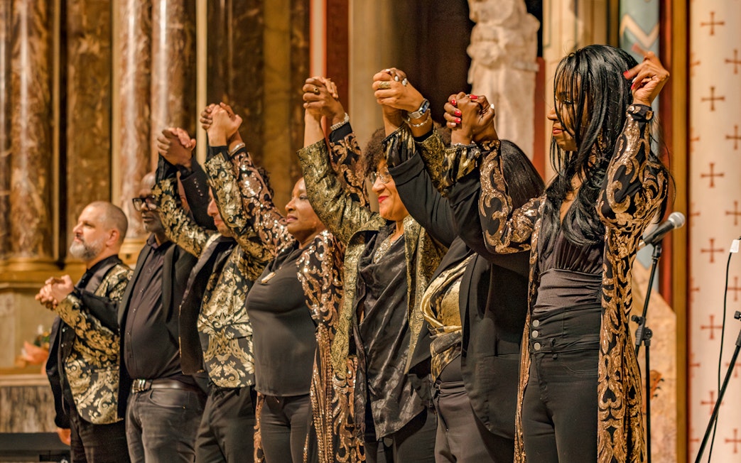 Orchestra taking a bow at St Sulpice Church concert.