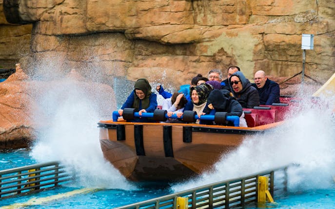 Visitors enjoying a water ride at Vialand Theme Park.