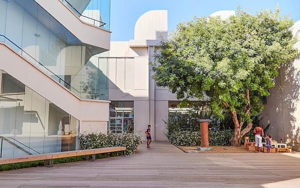 Joan Miró Foundation courtyard with visitors and modern architecture in Barcelona.
