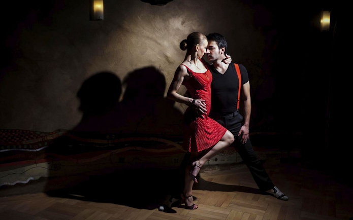 Dancers performing at Piazzolla Tango Show in Buenos Aires.