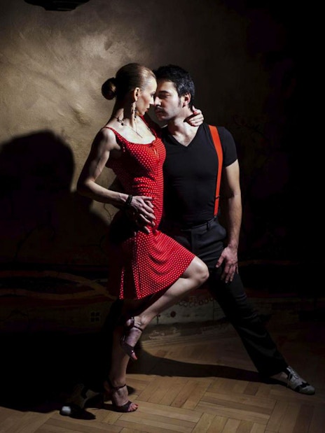 Dancers performing at Piazzolla Tango Show in Buenos Aires.