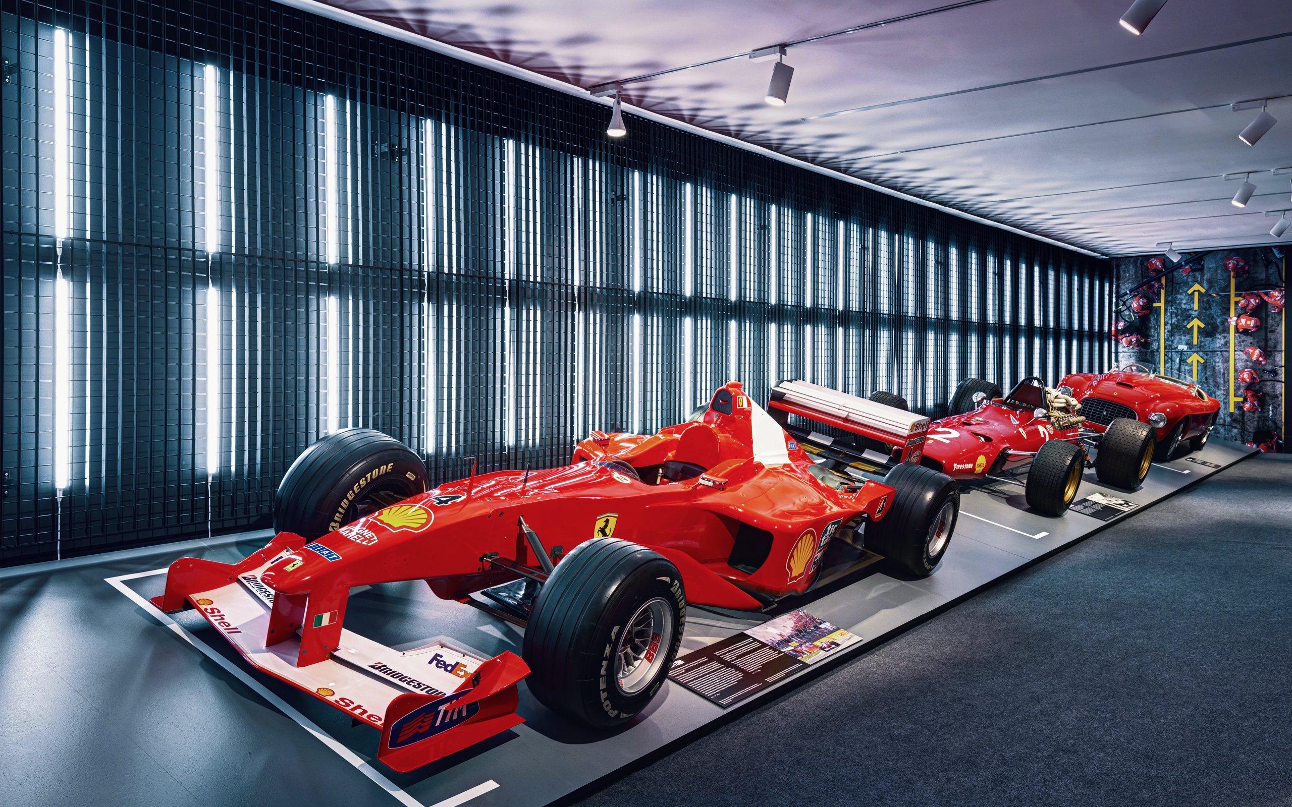 Formula 1 cars displayed at Ferrari Museum in Maranello.