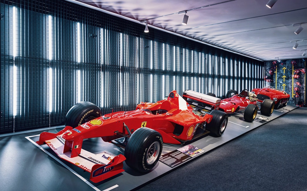Formula 1 cars displayed at Ferrari Museum in Maranello.