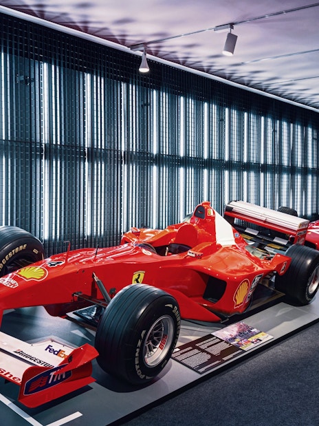 Formula 1 cars displayed at Ferrari Museum in Maranello.