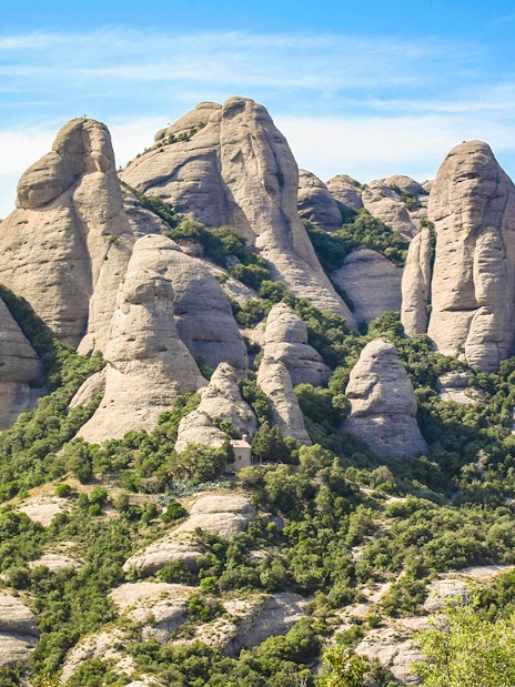 Rocky peaks of Montserrat Mountains viewed from a hot air balloon.
