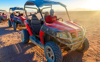 Buggy ride at sunset in the Palmeraie desert, Morocco.