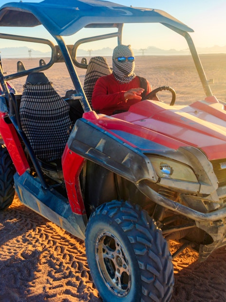 Buggy ride at sunset in the Palmeraie desert, Morocco.