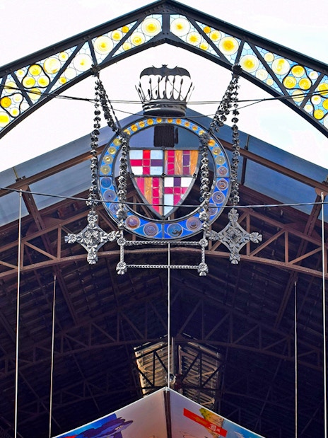 Entrance of La Boquería market with colorful stained glass, Barcelona Markets Walking Tour.