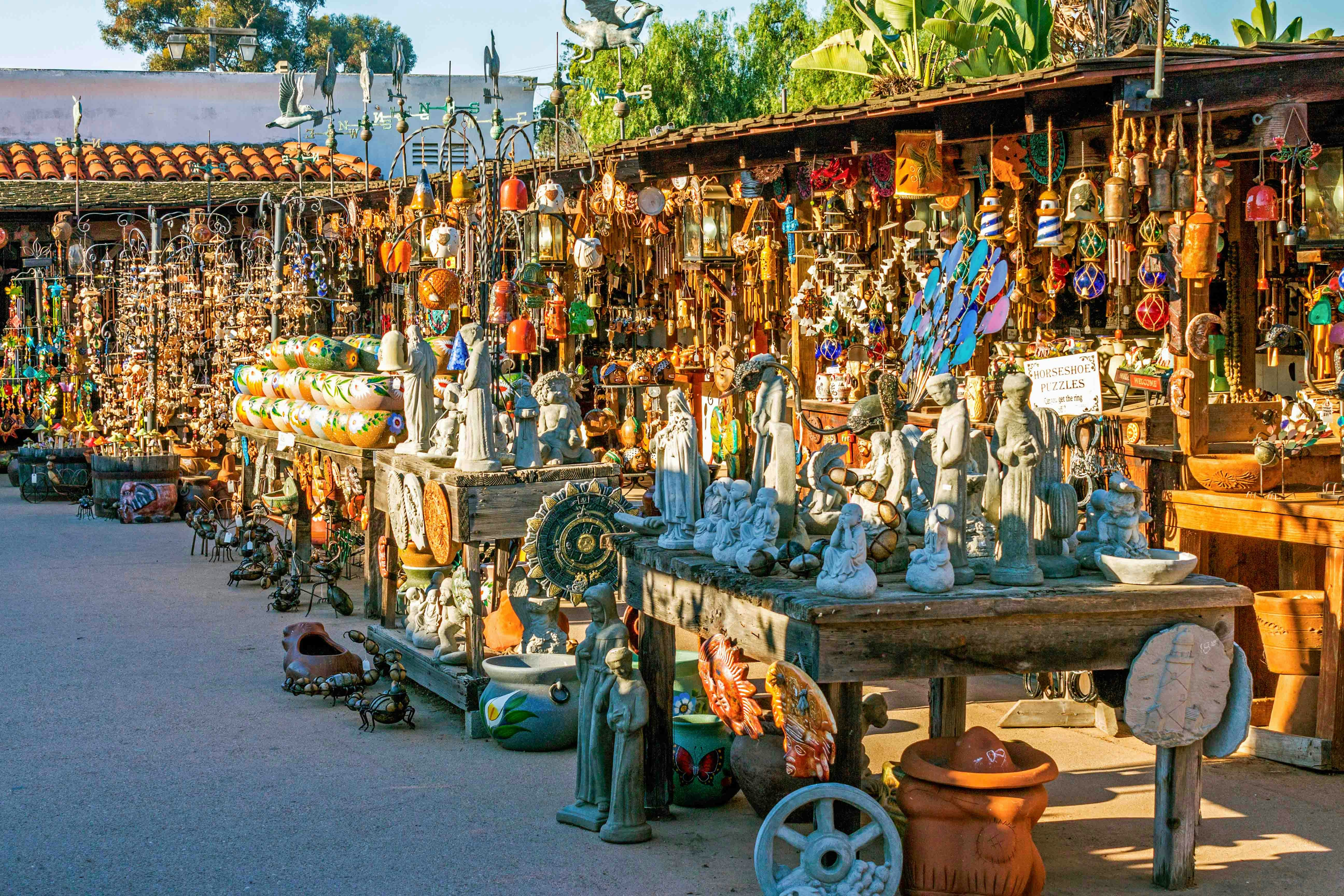 Old Town Market San Diego with colorful shops and visitors exploring local crafts.