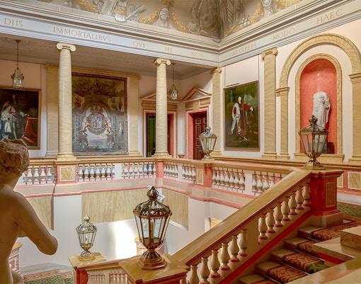 Staircase inside Liria Palace, Madrid, featuring ornate architecture and elegant design.