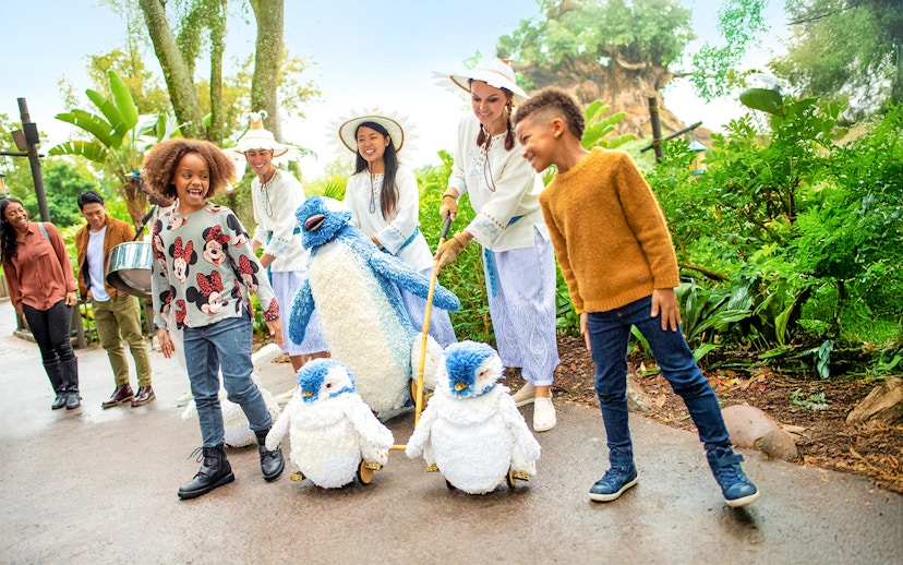 Guests enjoying toy penguins at Walt Disney World Resort, Orlando.