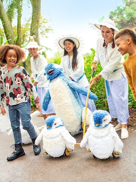 Guests enjoying toy penguins at Walt Disney World Resort, Orlando.