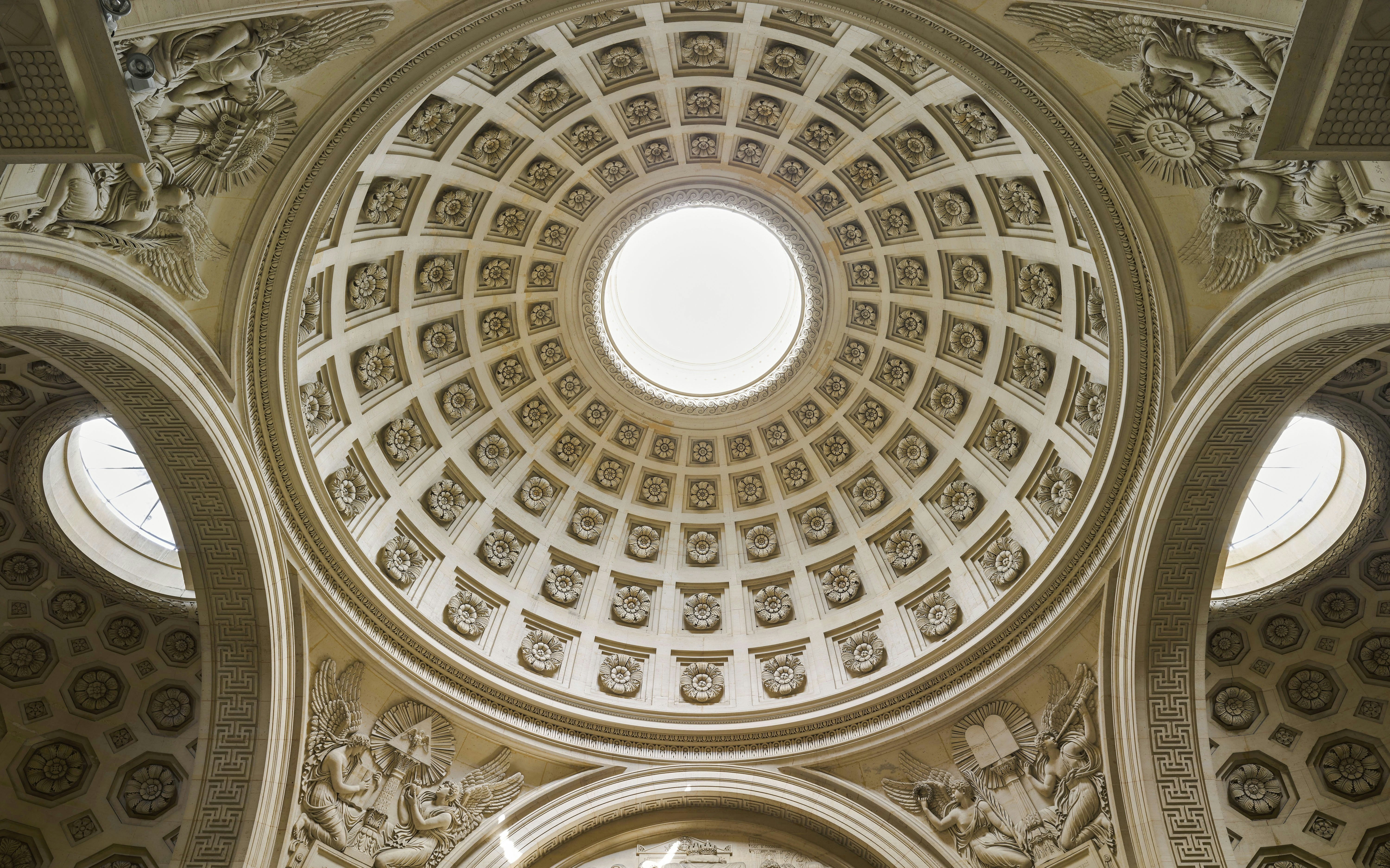 Expiatory Chapel dome with intricate carvings and circular skylight.