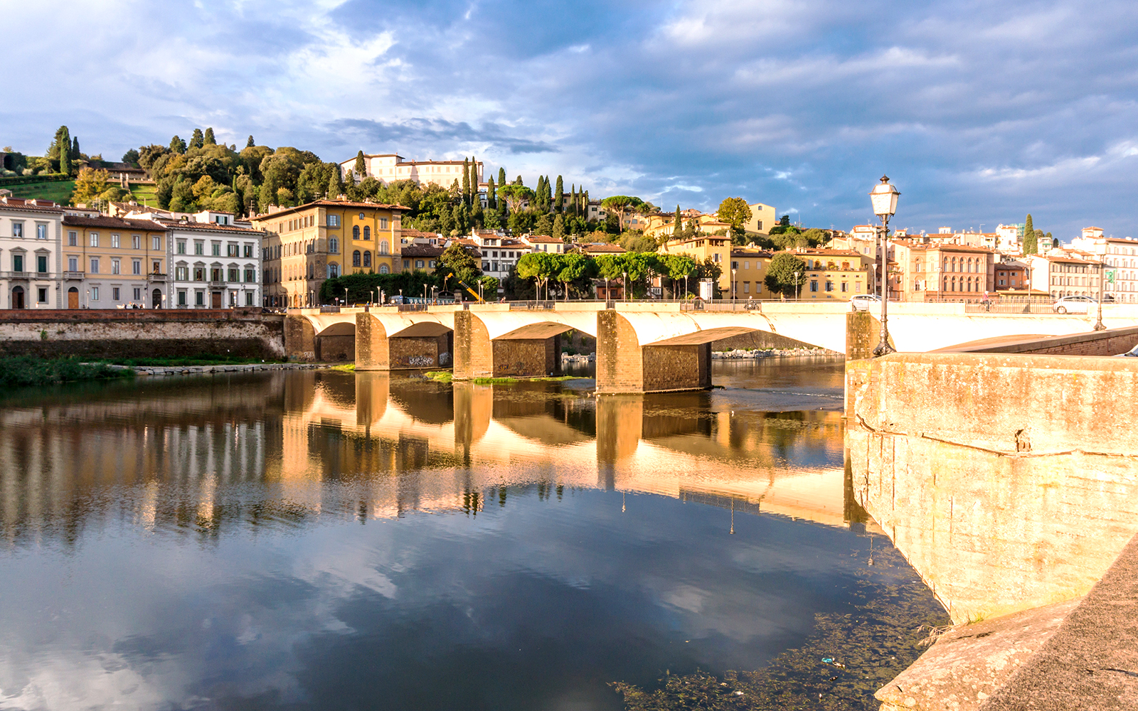 Vasari Corridor view along Lungarno Passage in Florence, Italy, showcasing historic architecture.