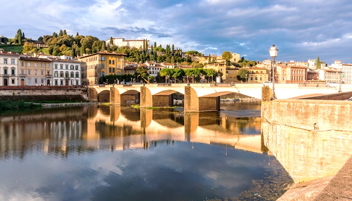 Vasari Corridor view along Lungarno Passage in Florence, Italy, showcasing historic architecture.