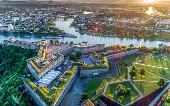 Aerial view of Ehrenbreitstein Fortress and Rhine River in Koblenz during a sightseeing cruise.