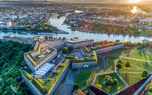 Aerial view of Ehrenbreitstein Fortress and Rhine River in Koblenz during a sightseeing cruise.