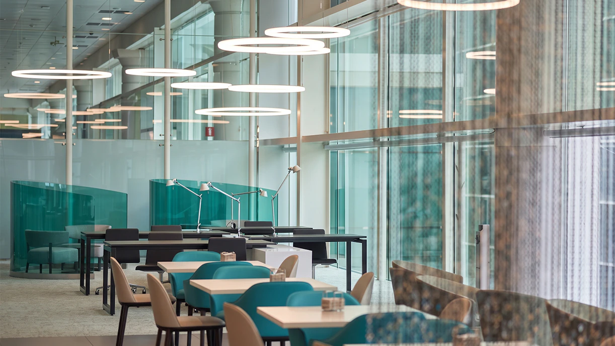 Colomer VIP Lounge seating area at Barcelona El Prat Airport T1 with modern decor.