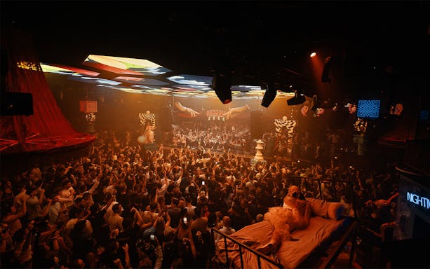 Crowd enjoying Bedouin Saga event at Ibiza nightclub.