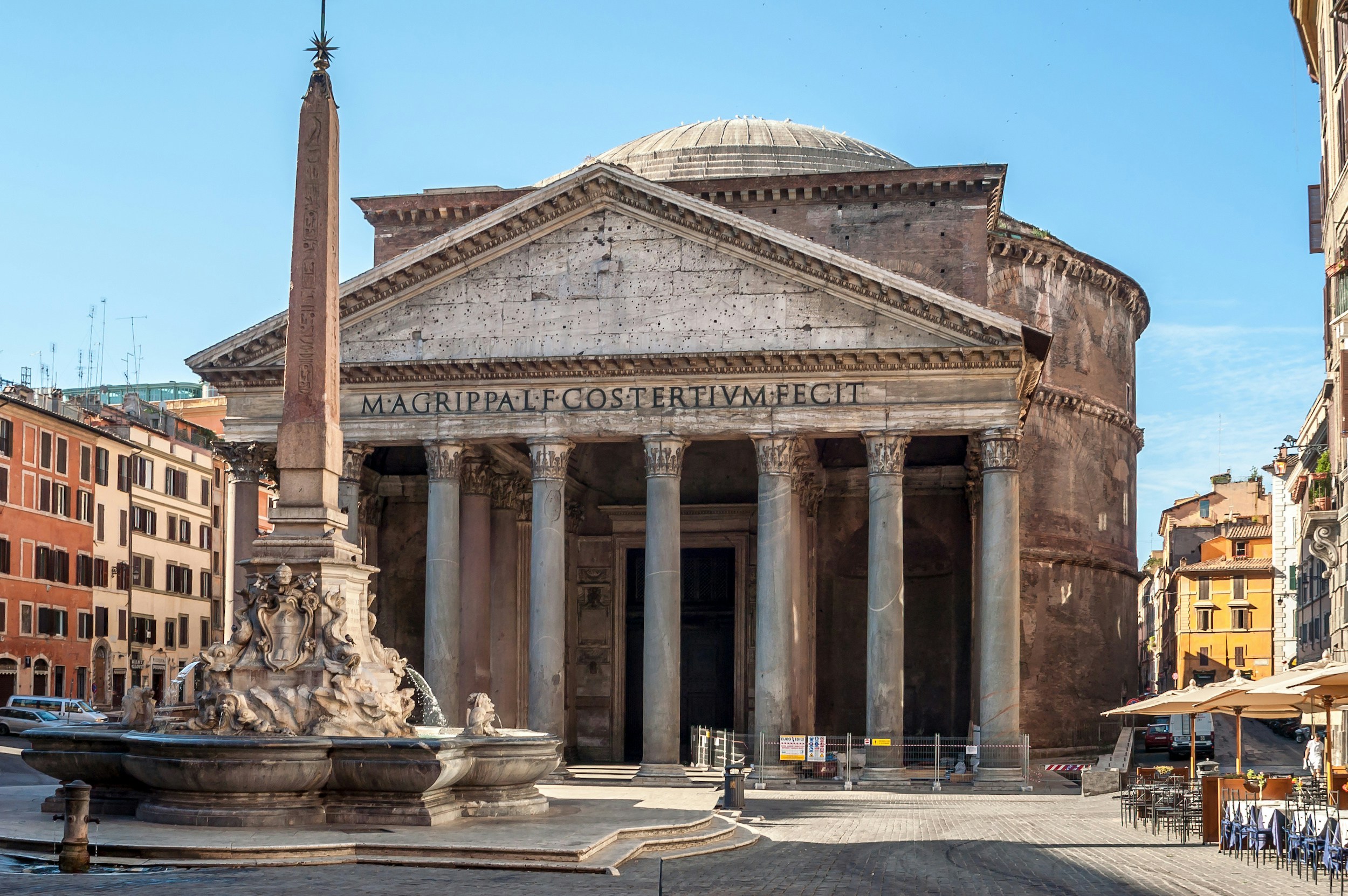 Pantheon in Rome with fountain and obelisk in foreground.