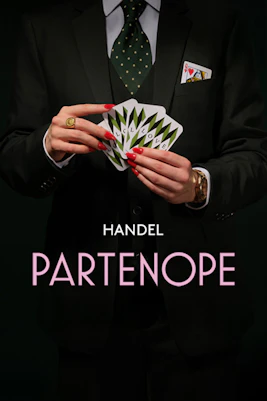 Person in suit holding cards with "Partenope" text, related to Handel opera.
