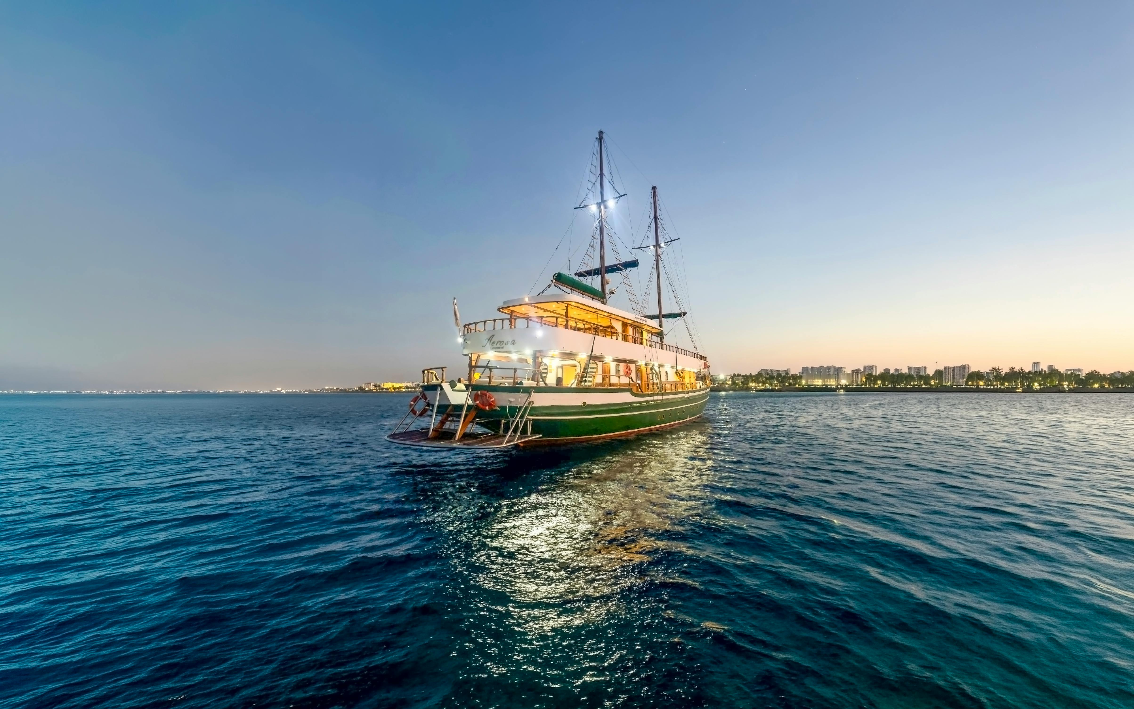 Cruise ship on Blue Lagoon at sunset near Ayia Napa, Cyprus.