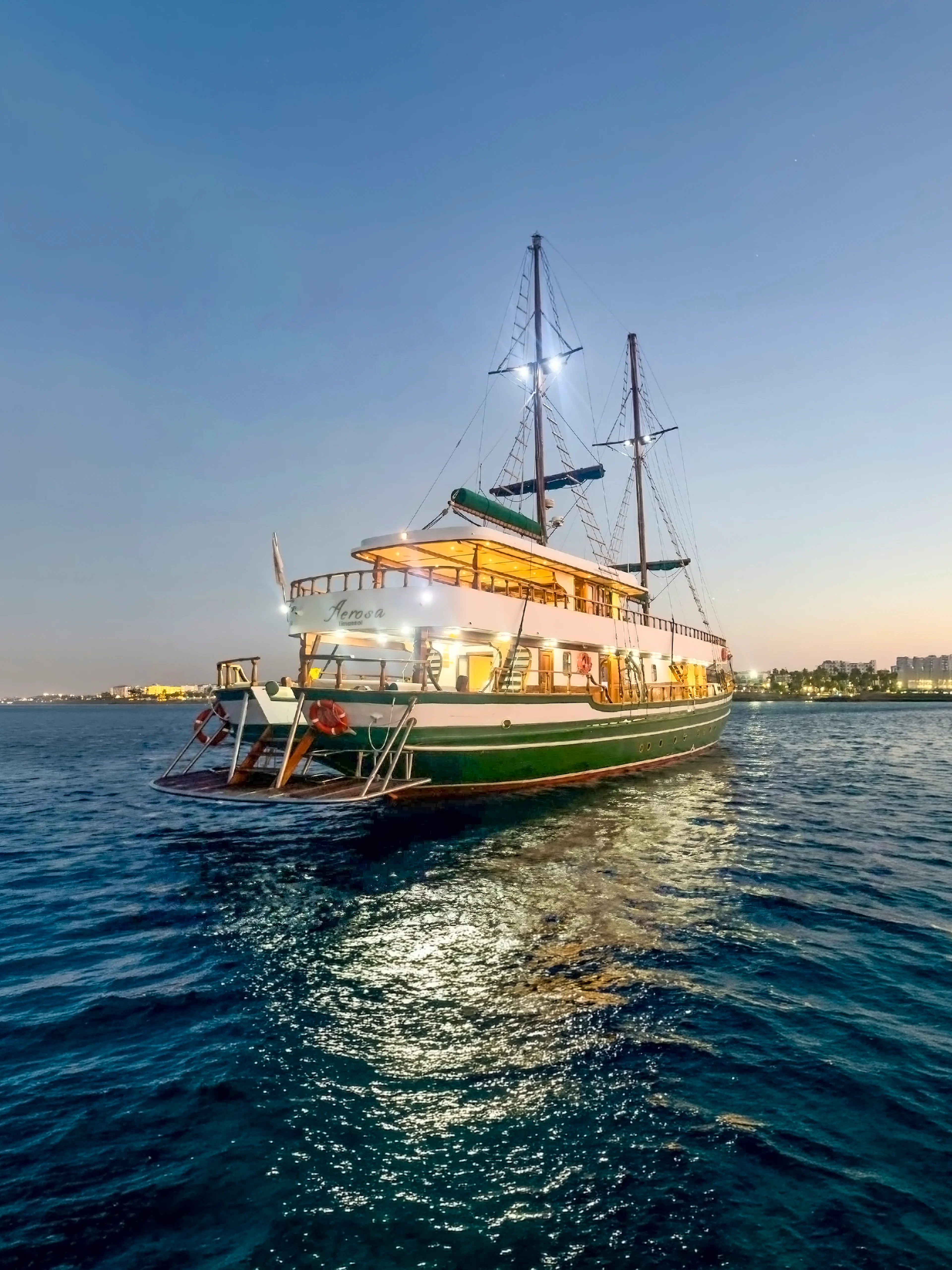 Cruise ship on Blue Lagoon at sunset near Ayia Napa, Cyprus.