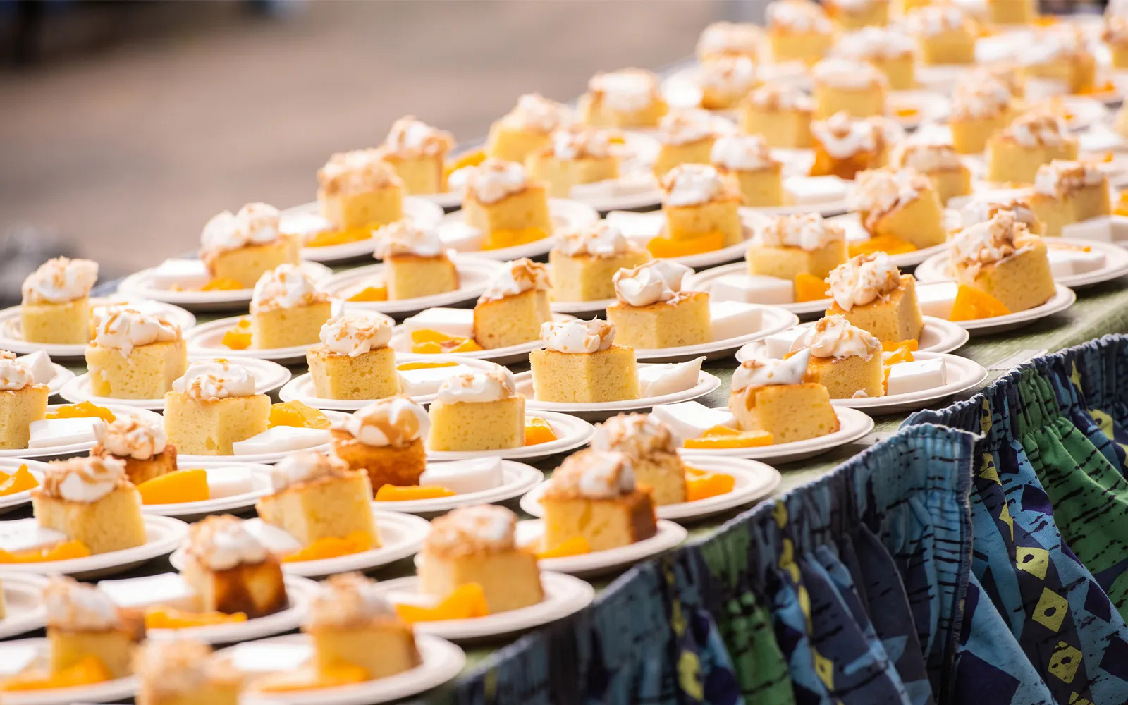 Coconut cake slices served at Voyagers of the Pacific Luau.