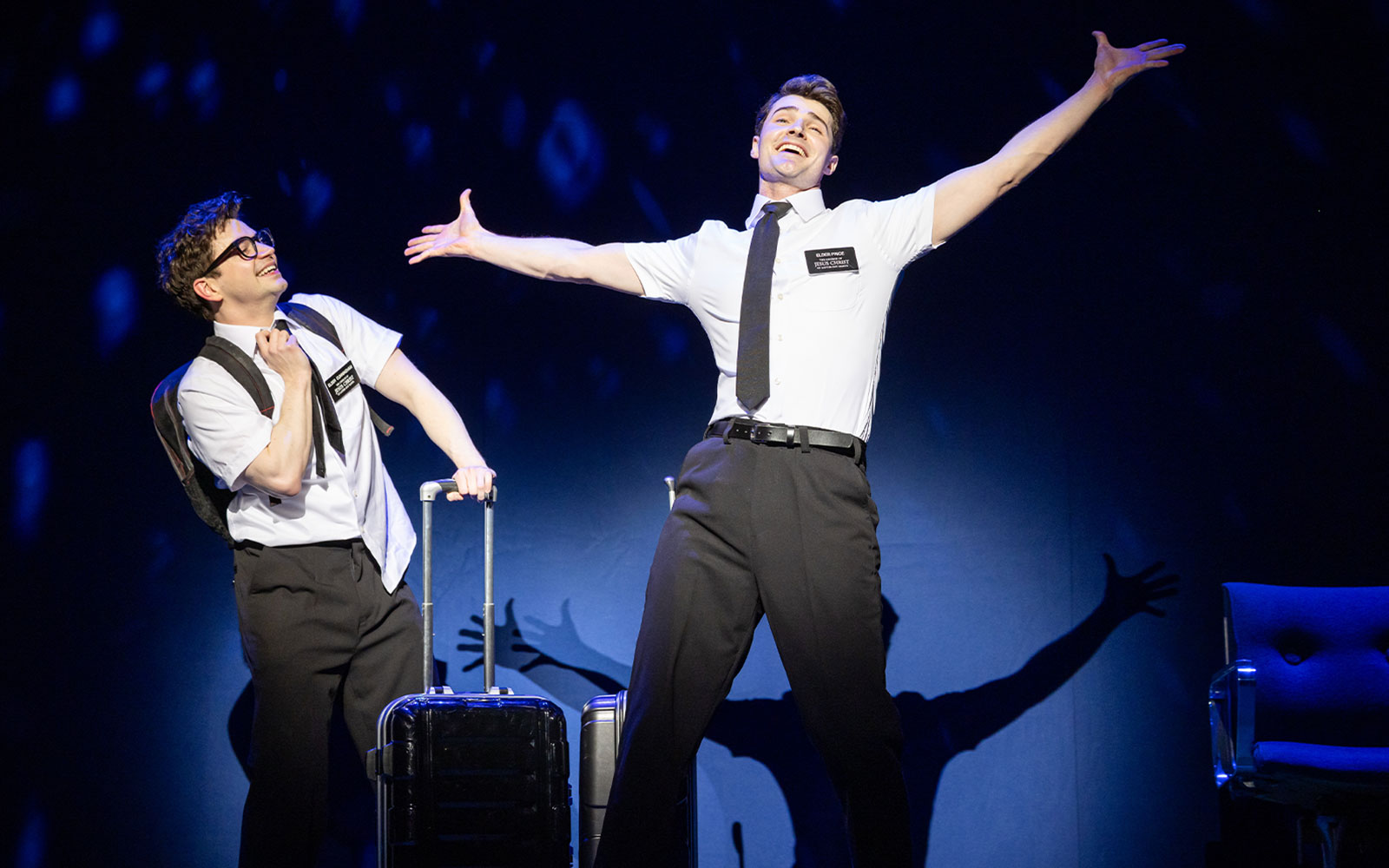Stage performance of The Book of Mormon in Sydney with two actors on stage.