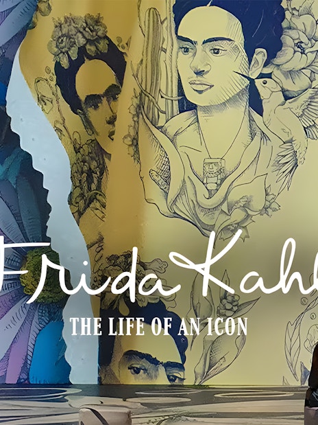 Frida Kahlo exhibit at Art Science Museum's Future World, featuring vibrant murals and visitors.