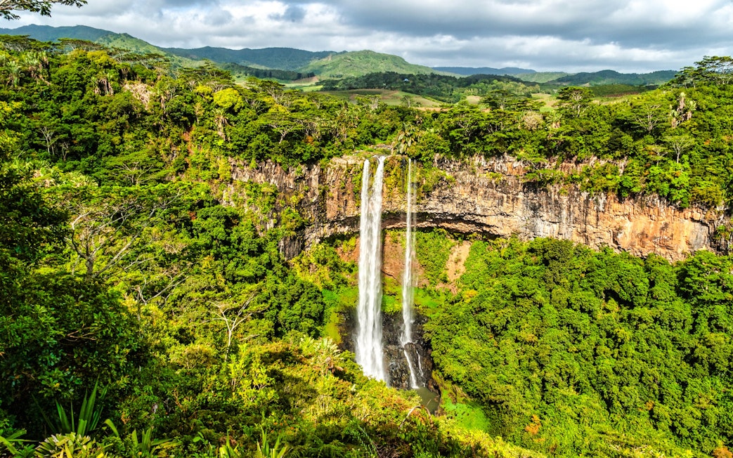 Alexandra Falls cascading through lush greenery in Mauritius.