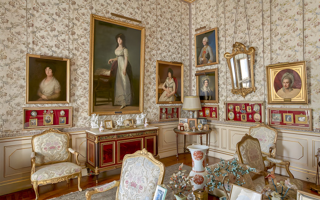Paintings and portraits in an ornate room at Liria Palace, Madrid.
