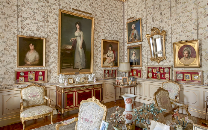 Paintings and portraits in an ornate room at Liria Palace, Madrid.